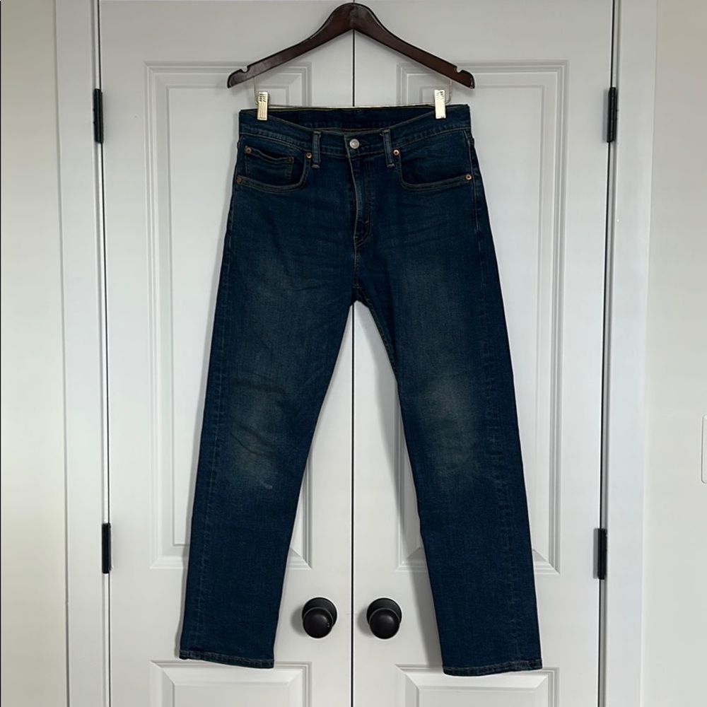 Levi’s 502 medium wash jeans